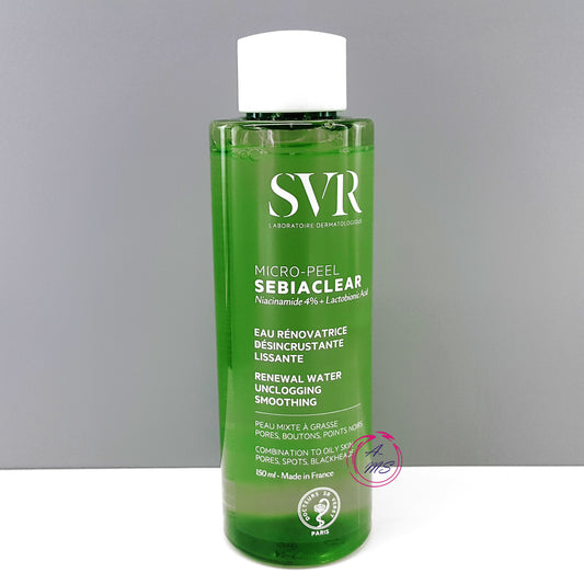 Green bottle of SVR Sebiaclear skincare product on a gray background